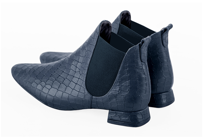 Denim blue women's ankle boots, with elastics. Square toe. Flat flare heels. Rear view - Florence KOOIJMAN